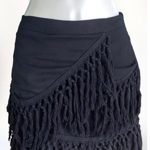 BANANA- size Medium women's black skirt with diagonal fringes.